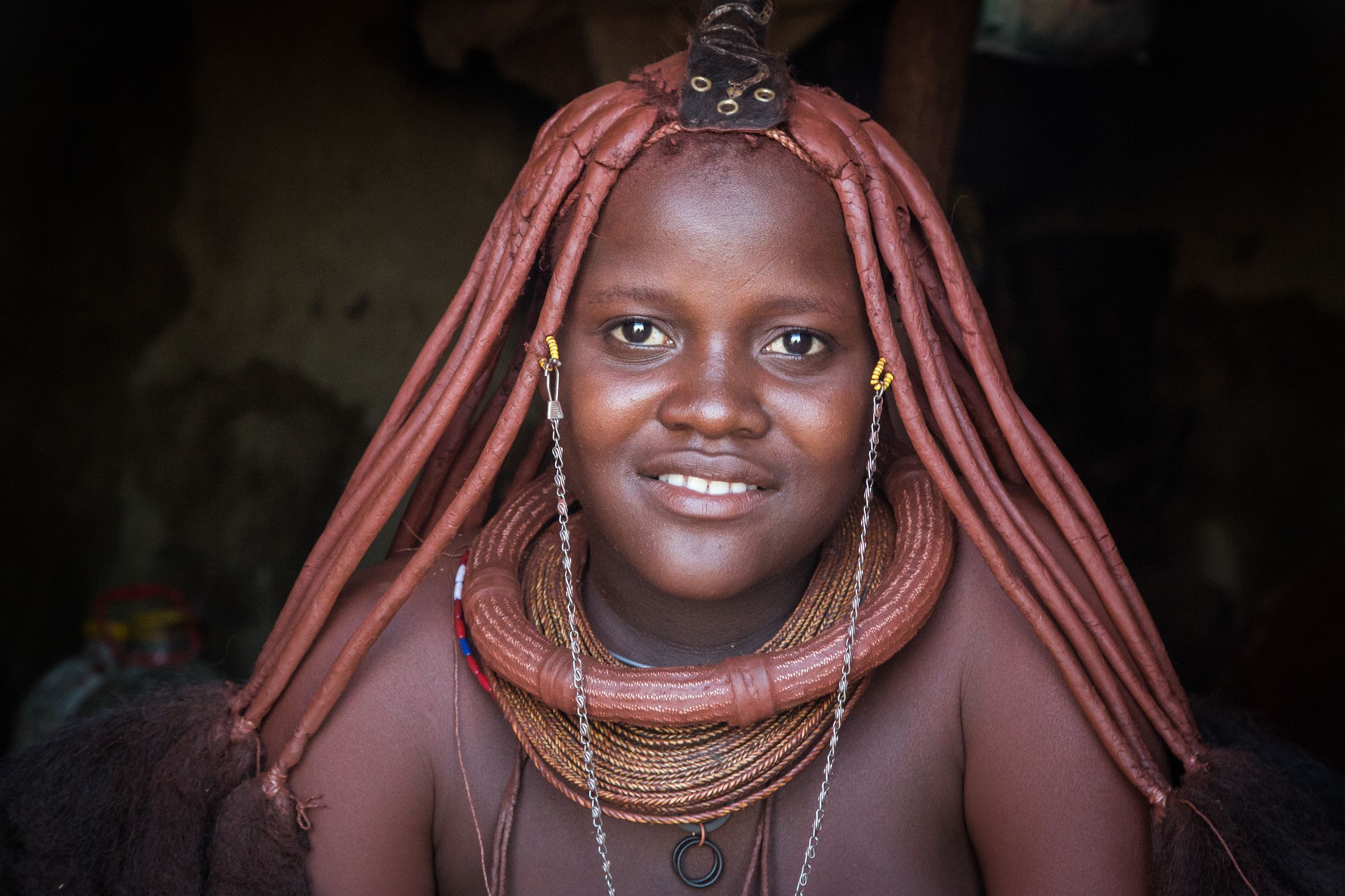 Portrait of a Himba girl on our photography tour of Namibia