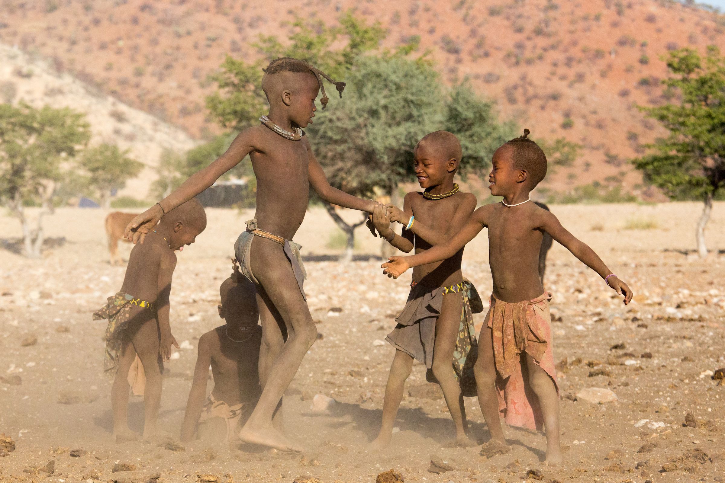 Himba children playing in remote Kaokoland, northern Namibia