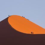 Sunset walkers on Dune 45