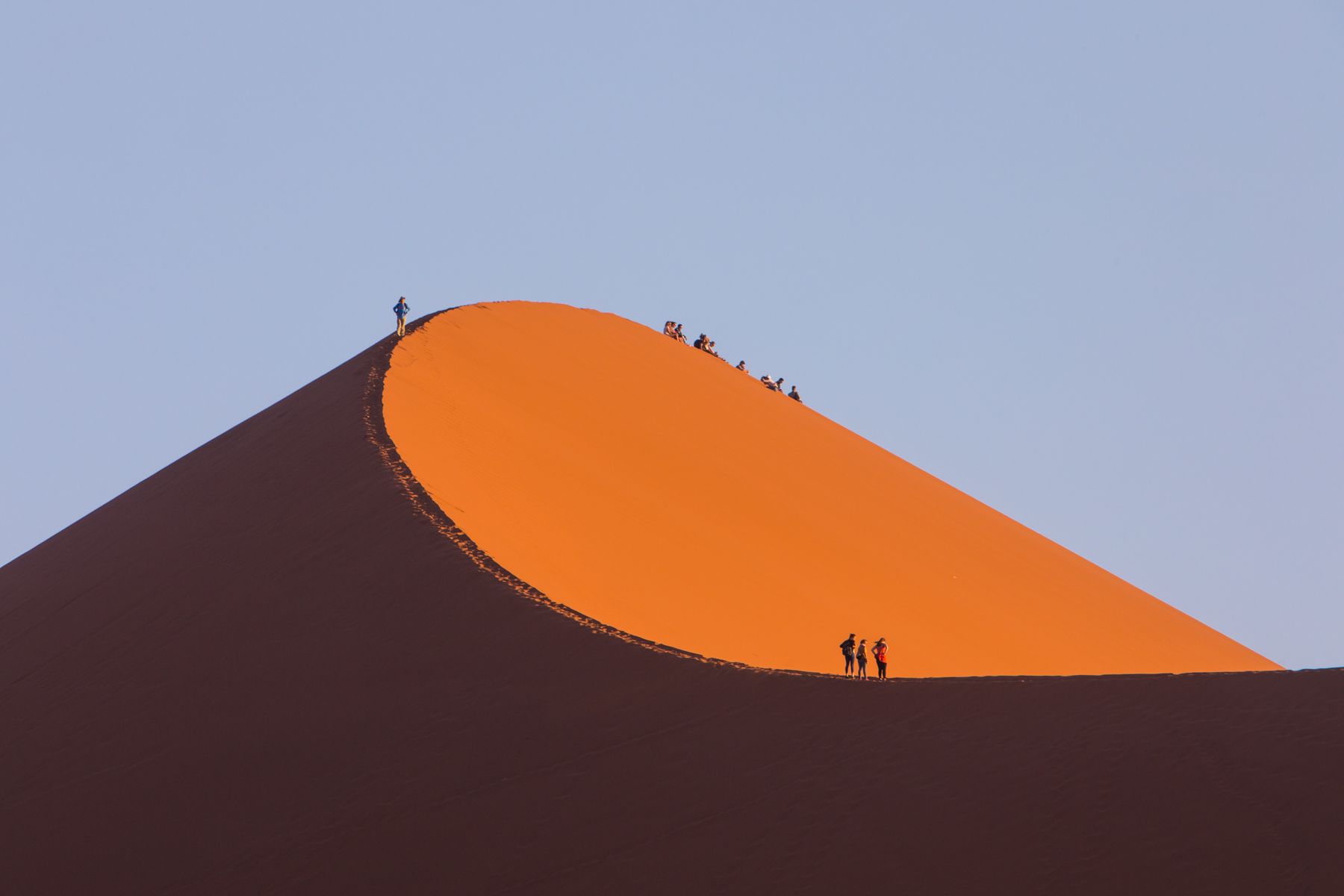 Sunset walkers on Dune 45