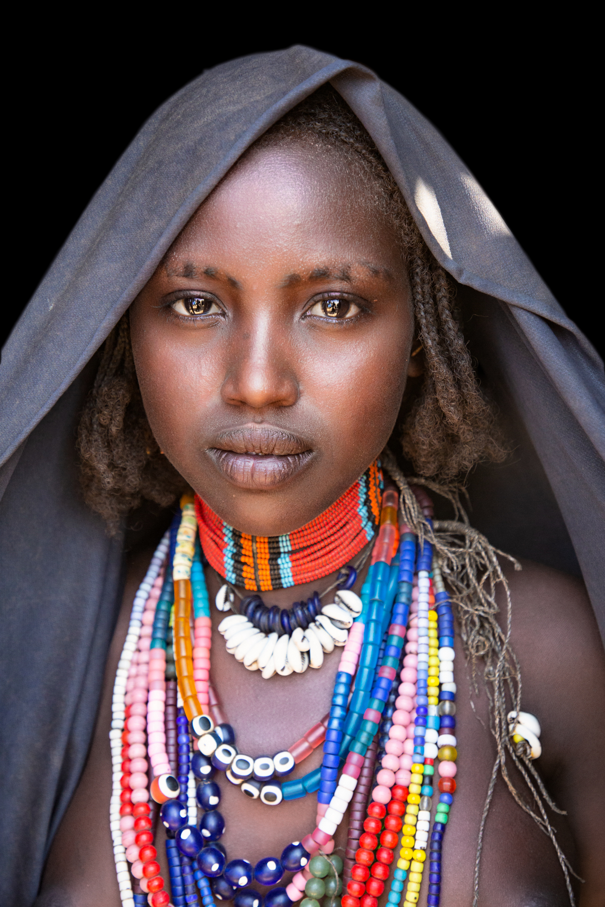 Portrait of a beautiful Arbore girl on the shores of Lake Chew Bahir