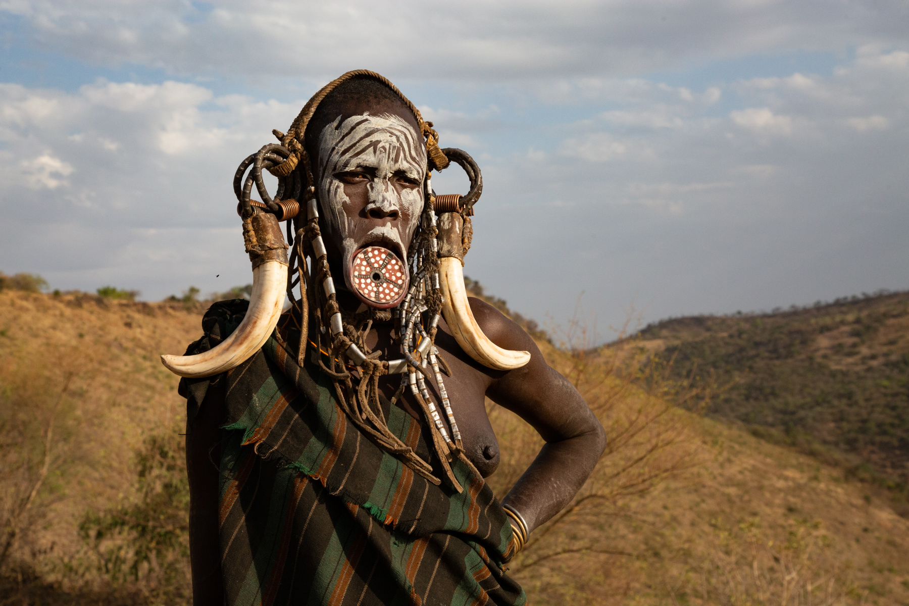 Portrait of a decorated Mursi woman