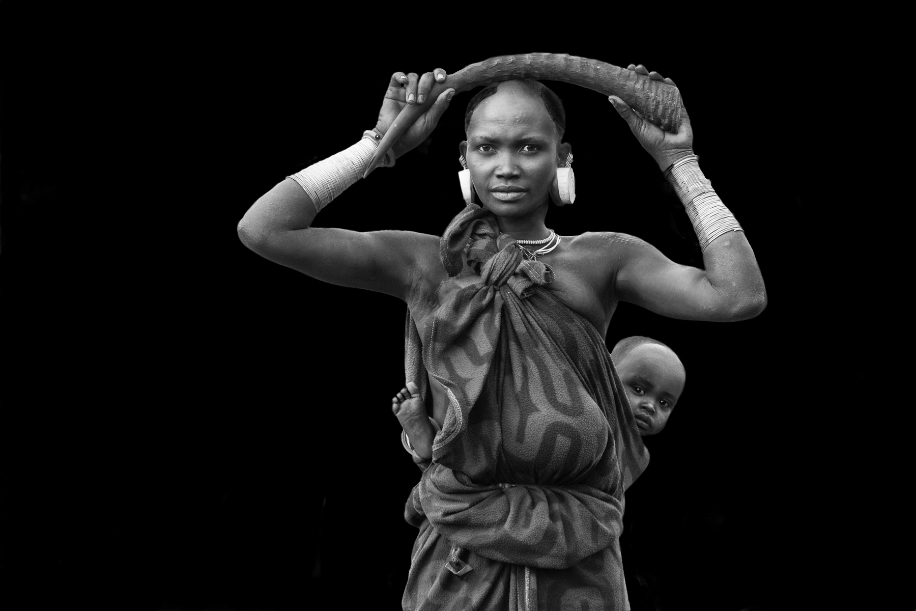 Black and white portraits of the Suri people in the Omo Valley with Wild Images