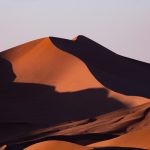 The quiet, dreamlike landscapes of Sossusvlei at sunset