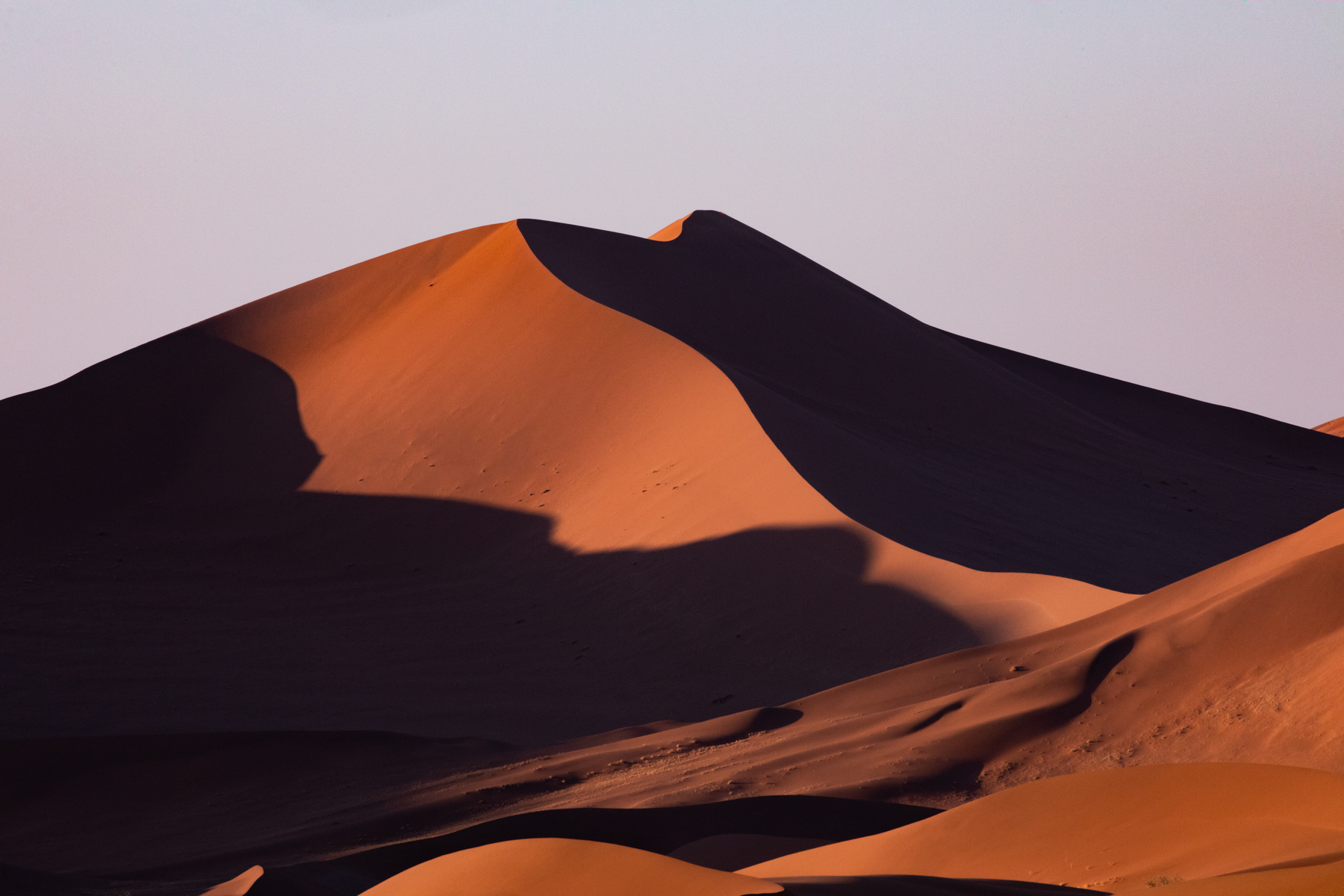 The quiet, dreamlike landscapes of Sossusvlei at sunset