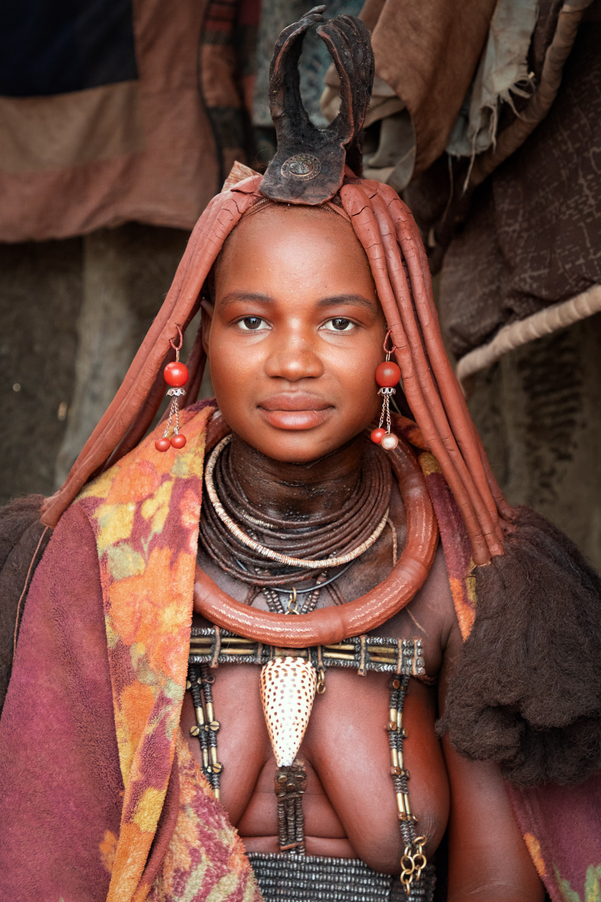 Portrait of a beautiful Himba girl in remote Namibia on our photo tour