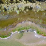 An aerial view of the coastline at Walvis Bay during our Namibia photo tour