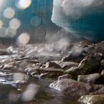 Lights dance off a glacier with stunning bokeh effect (image by Irene Amiet)