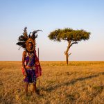 Portrait of a Maasai warrior wearing an Isidai on our Kenya photography tour (image by Inger Vandyke)