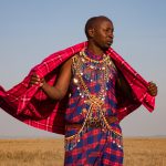Portrait of a Maasai warrior and his shuka on our photography tour of Kenya (image by Inger Vandyke)