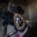 Portrait of a Maasai warrior wearing an Isidai on our Kenya photography tour A Little Bee-eater with his wasp lunch (image by Inger Vandyke)