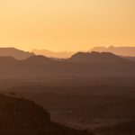 The layered mountains of Damaraland in a golden sunset
