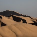 Rippled dune peaks and shadow characterise the Skeleton Coast at Sandwich Harbour