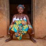 Portrait of Adoua, the high priestess of twins on our Benin photography tour