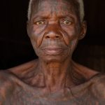 Portrait of Alloya. She is one of the last elderly women with extensive, traditional Holi tattoos