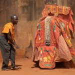 Each Egunun must be guarded by a human. If they accidentally touch a spectator of the dance then the touched person may momentarily die