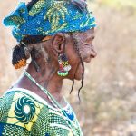 Portrait of Fati, a traditional nomadic Fulani woman with her beautiful facial tattoos