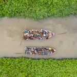 Getting to Benin's remote freshwater fishing villages requires you to take 'commuter pirogues' with the locals through some very narrow waterways
