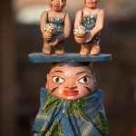 Guelede masks are carved in a quirky array of designs, this one celebrating Benin's famous twins