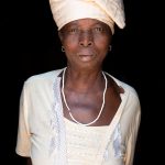 Inchi, an elderly Otamari woman and owner of a beautiful Tata on our Benin photo tour