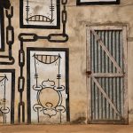 Street art in Ouidah often depicts symbols that are reminiscent of the cities slaving history