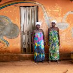 On our Benin photo tour meet Voodoo adepts at the palace of King Agassa in Abomey