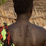 The Laarim are not only known for their jewellery, the women engage in spectacular keloid scarification to decorate their bodies