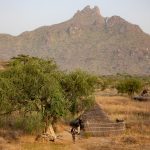 Beautiful Laarim villages dot the foothills of the dramatic Kimotong Mountains of South Sudan