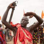 Malik poses like a cow during the Yanguera dance of Mundari people