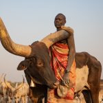 Portrait of a Mundari cattle keeper on our South Sudan photo tour