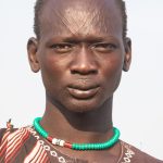 Traditional Mundari scarification is a 'V' shape on the foreheads of Mundari people