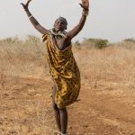 Capture action photos of African dancers on our South Sudan photography tour