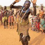 Strike a pose! A Toposa woman stops for our cameras during the Meriye dance of her people