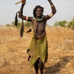 The lead female dancer at the Toposa Meriye ceremony on our South Sudan photo tour