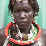An elderly Toposa woman in the market at Kapoeta on our South Sudan photography tour