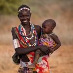 Portrait of a beautiful Toposa woman and her baby