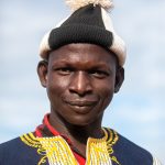 Portrait of a Boloye musician at a performance of the Panther Dance