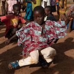 Each Boloye dance starts with local children bringing in the masked dancers