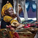 Portrait of a young girl in the street market of Korhogo on our photo tour of Ivory Coast