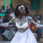 A Komian traditional healer performing her circular dance of the spirits