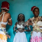 A group of Komians prepare to dance on our photo tour of Ivory Coast