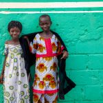 Portrait of two beautiful Ivorian girls at the ancient town of Kong, Ivory Coast