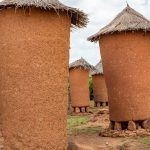 Hand sculpted stilted granaries at Niofoin on our photo tour to Ivory Coast
