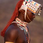 A young Samburu man has a contemplative moment