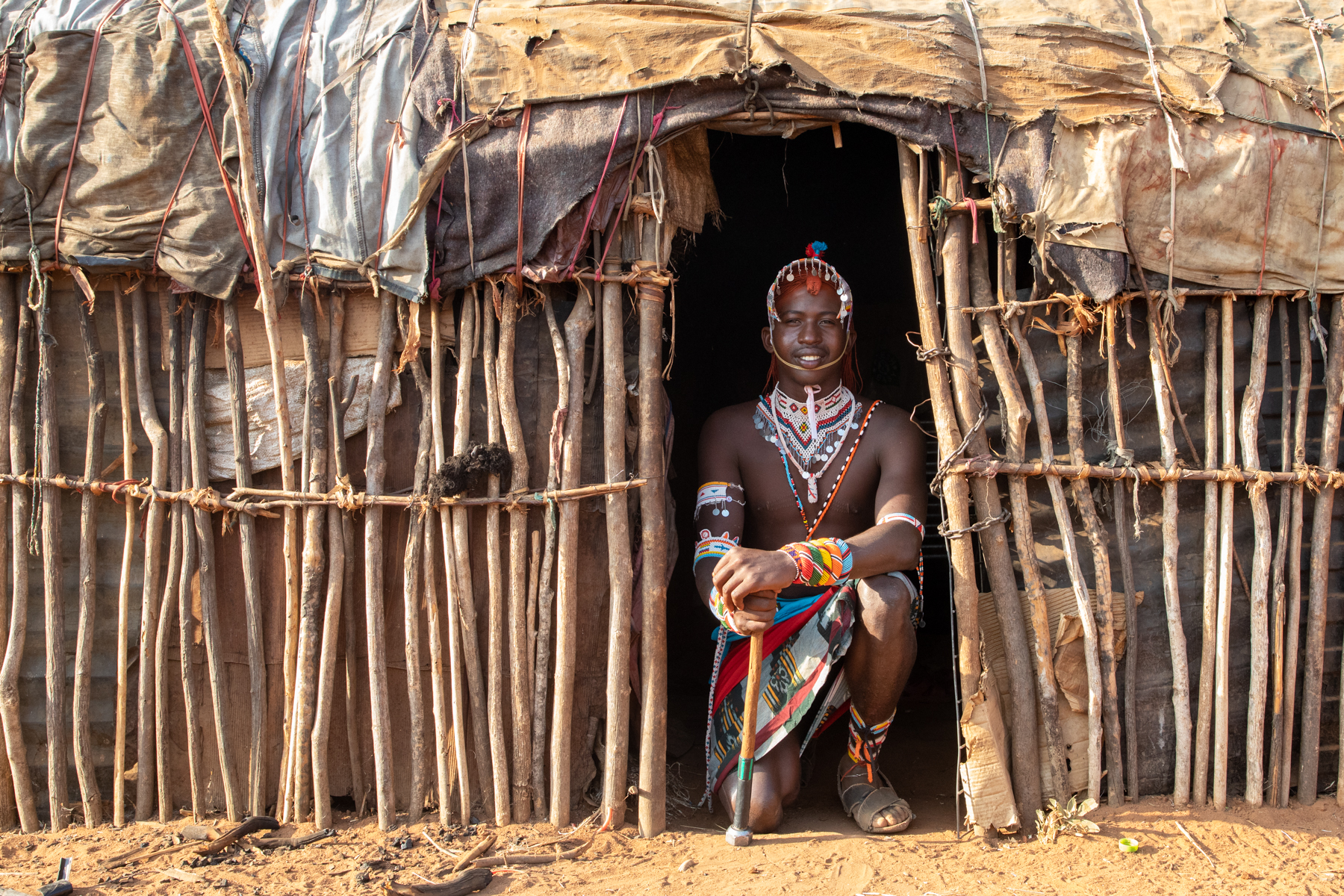 Portrait of a young Samburu man at his home in northern Kenya
