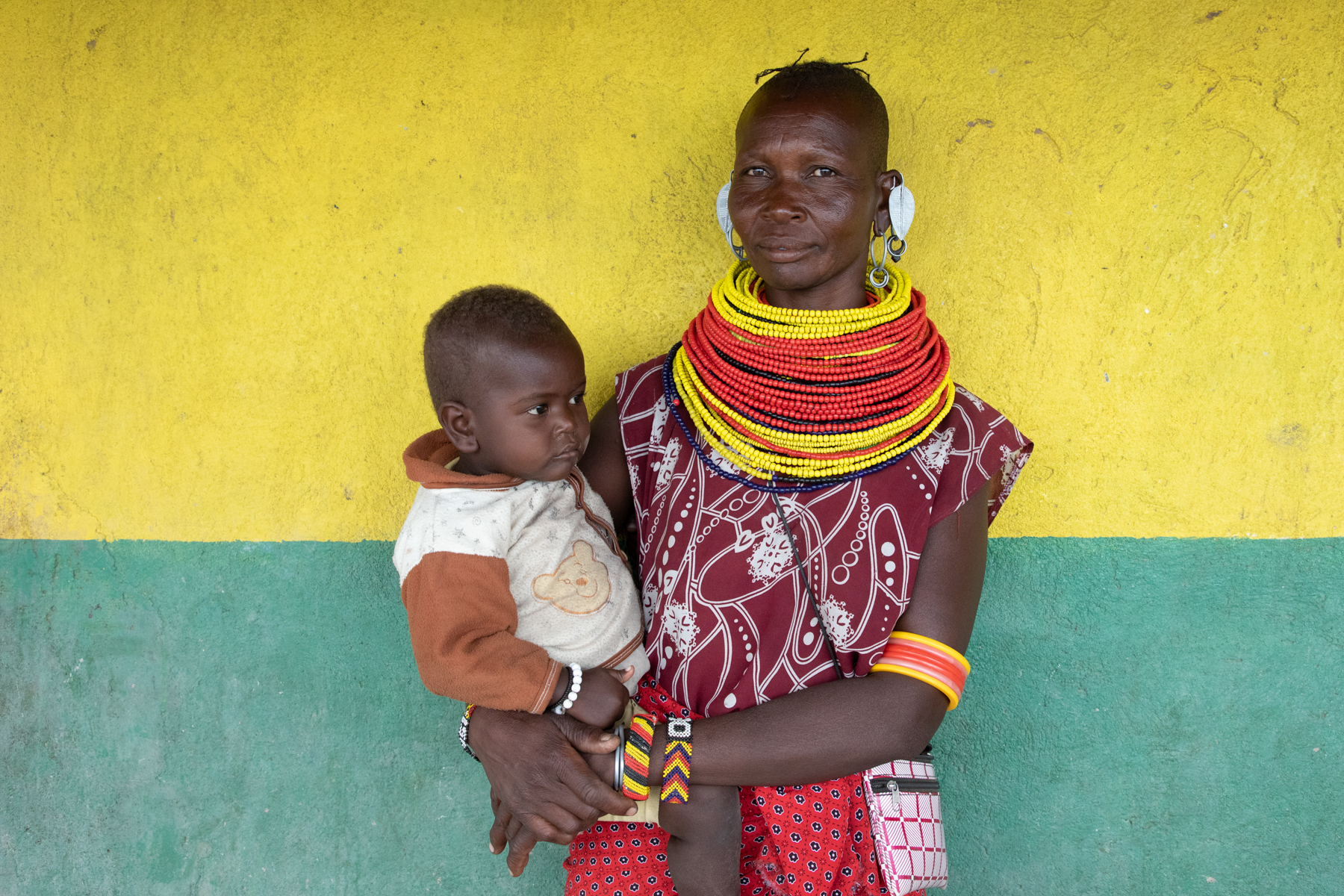 A Turkana woman and her baby on our Lake Turkana photography tour, Kenya