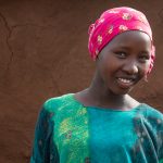 The shy smile of a pretty Waata girl in Kenya