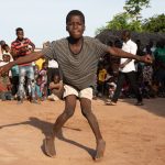 Watch young Zaouli dancers learn their moves on our Ivory Coast photography tour