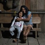 Spending time with Waorani people at home is a highlight of our photo tour in the Amazon of Ecuador