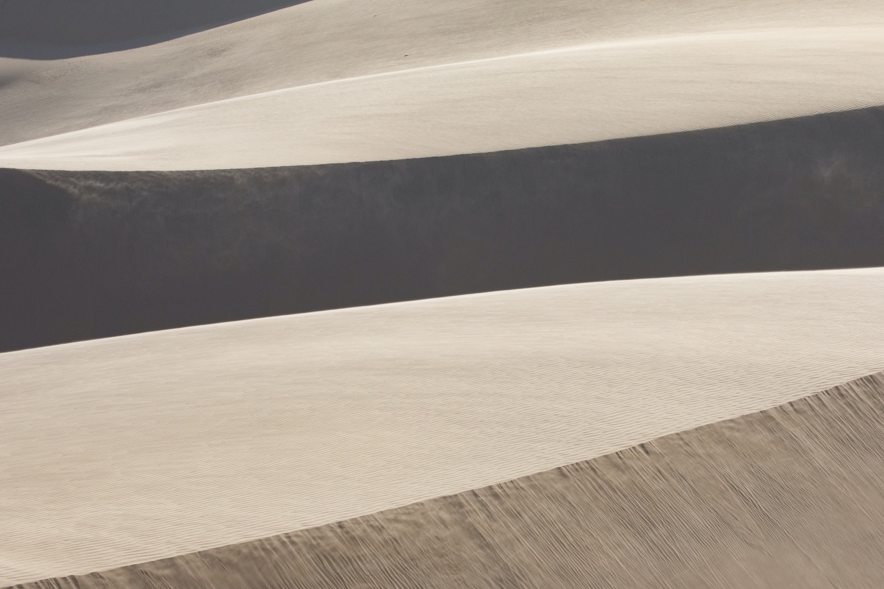 Layered dunes at Sandwich Harbour during our Namibia photography tour